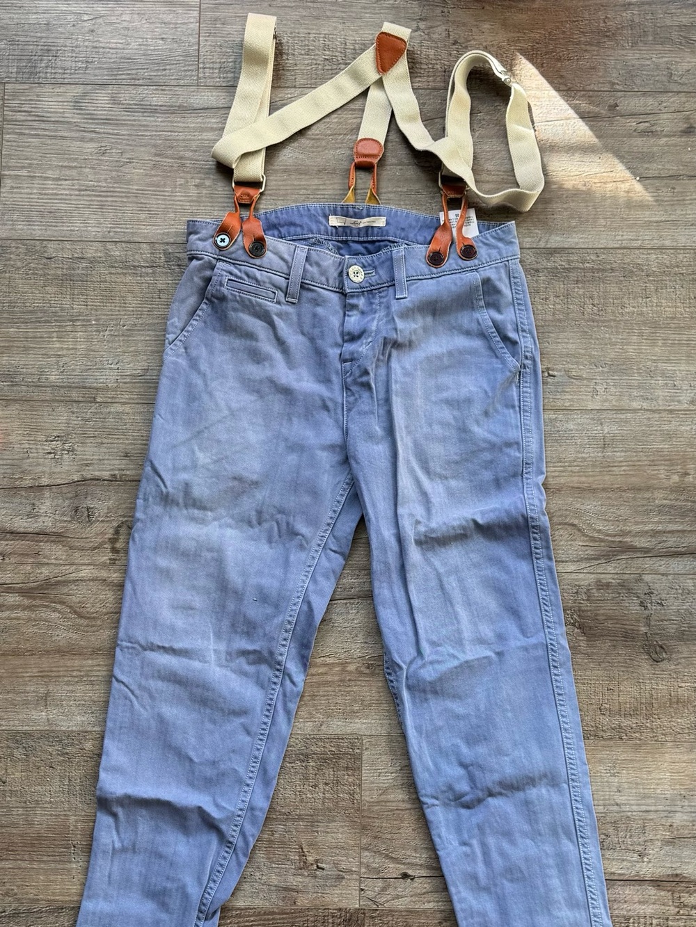 Levi's Light Blue Jeans with Beige Suspenders Detail